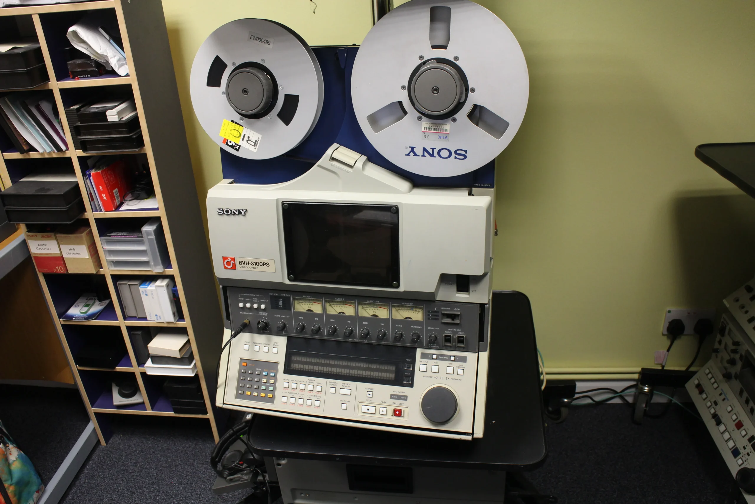 A VCR, or videocassette recorder, is a device used to play and record videos on videocassettes.