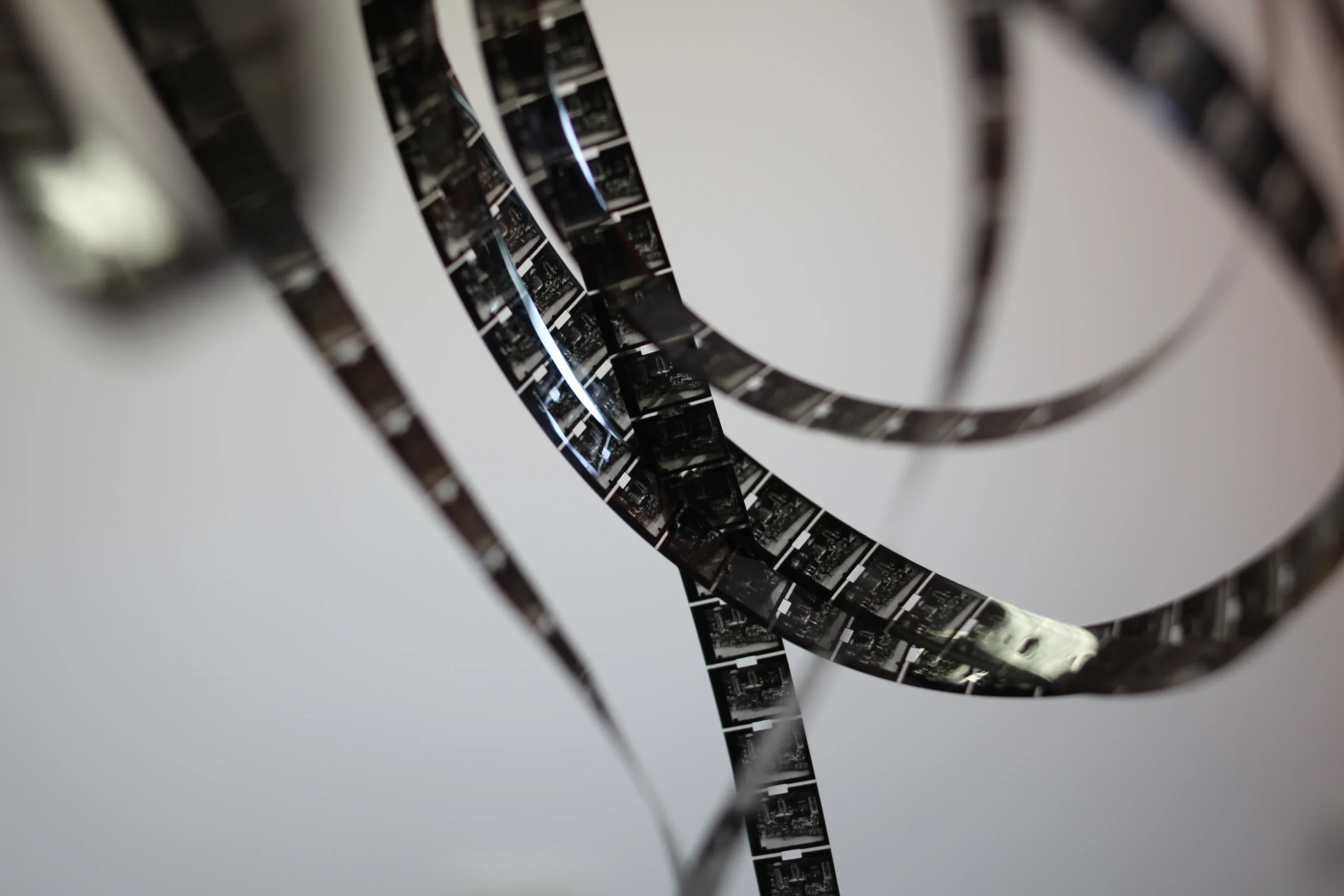 Collection of black and white film strips on a white background. Film Tape.